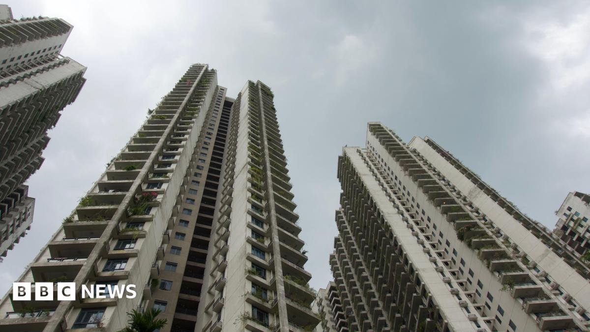 These seaside apartments were a ghost city – then police say scammers moved in